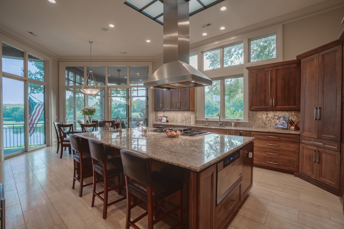 Granite island with six-burner cooktop
